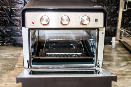 Inside of the modern air fryer oven in the kitchen.の写真素材