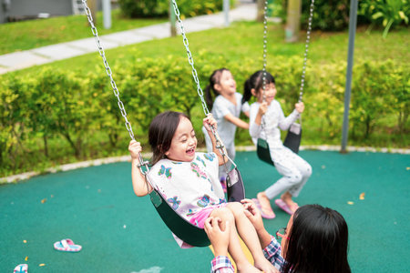 Kuala Lumpur, Malaysia - November 2019: Active children playing at the playground. Happy and fun time.のeditorial素材