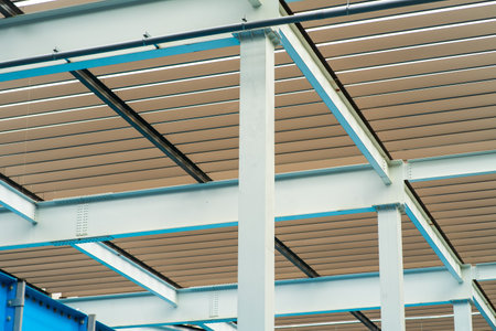 Low angle view of modern roof awning outside of building.の写真素材