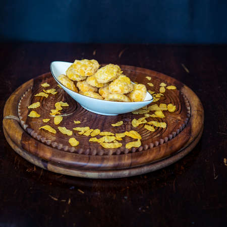 Homemade Cornflake cookies on a wooden background.の写真素材