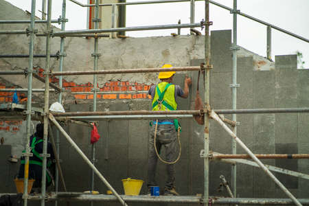 Kuala Lumpur, Malaysia - January 22, 2021: construction worker in the construction site.
