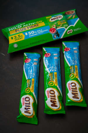 Kuala Lumpur, Malaysia - Mar 2021: Milo Activ Go Plus Fibre 3 in 1 sachet less sugar. Milo is a...
