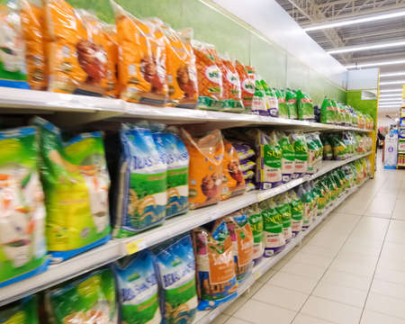 Bangi, Malaysia - March 28, 2021: Rice products packed available for sell at supermarket shelf in Malaysia with selective focus.のeditorial素材