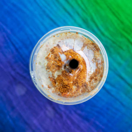Iced blended caramel coffee topped with crushed caramel biscoff in plastic glass. Hot season...