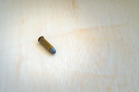 Bullet on a wooden background.の写真素材