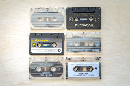 Kuala Lumpur, Malaysia - May, 2021 Set of old audio cassettes on wooden backgroundのeditorial素材