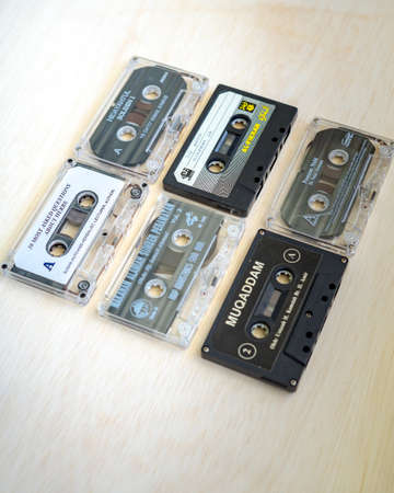 Kuala Lumpur, Malaysia - May, 2021 Set of old audio cassettes on wooden backgroundのeditorial素材