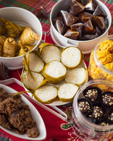 Traditional Malay Food and cookies during Ramadan and Eid Mubarak. Hari Raya Aidilfitri. Ketupat, rendang, lemang, dodol, biskut.の写真素材