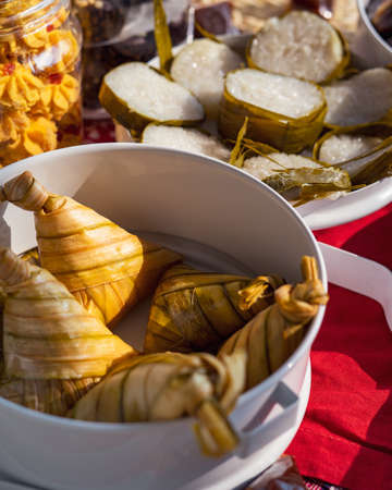 Traditional Malay Food and cookies during Ramadan and Eid Mubarak. Hari Raya Aidilfitri. Ketupat, rendang, lemang, dodol, biskut.の写真素材