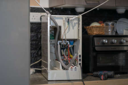 Kuala Lumpur, Malaysia - July 10, 2021 Changing water filter at home.のeditorial素材