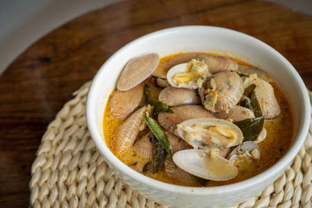 Chilli Butter Cream Clam served in a bowl on a table.