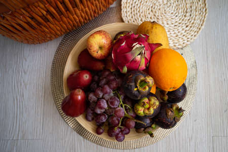 Fresh fruits. Assorted colourful tropical fruits. clean and healthy eatingの写真素材