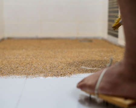 Color flake flooring textured background .Close up.Color Flakes make resinous flooring as beautiful as it is practical.Concrete floor,sprinkle with flake stone and smooth.の写真素材