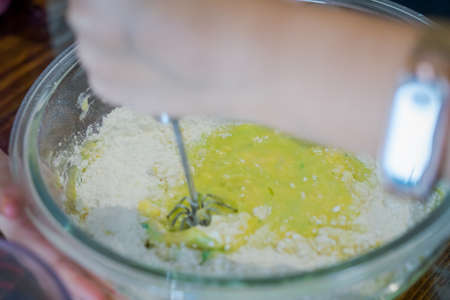 Blurry focus of Mixing Pandan Green Batter or dough for cake or muffin or pancake.の写真素材
