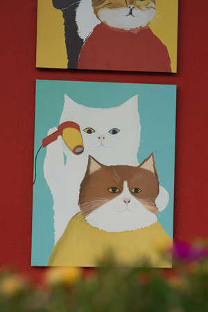 Kuala Lumpur, Malaysia - September 18, 2021 Cute cat paintings at the cat parlour shop.のeditorial素材