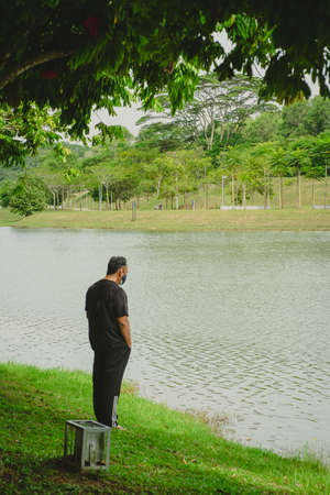 Lake with water ripples in the park of Putrajaya, Malaysia.の写真素材
