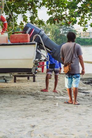 Port Dickson, Malaysia - Nov 5, 2021: Vessel bilge pump removes water from boat through drain scupper in Boardのeditorial素材