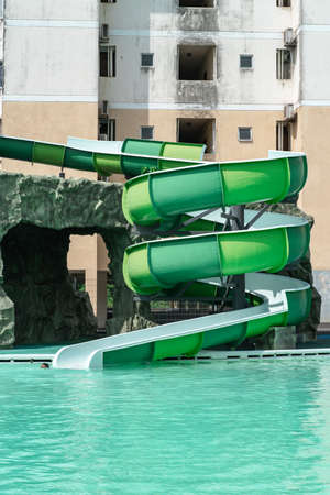 Port Dickson, Malaysia - Nov 19, 2021:   Colourful spiral slide at the Ehsan Water park.