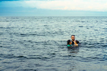 Bearded man swimming in the sea.の写真素材