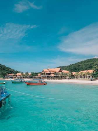 Boats, turquoise water and white sand beach, Redang Island, Malaysiaの写真素材