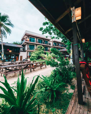 Redang, Malaysia - May 10, 2022 : Beach resort hotel landscape decoration with palm trees.のeditorial素材