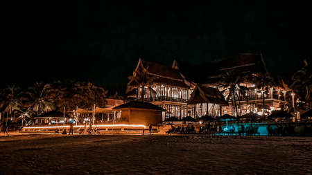 Redang, Malaysia - May 11, 2022: Seri Pacifica Resort at night by the beach.のeditorial素材