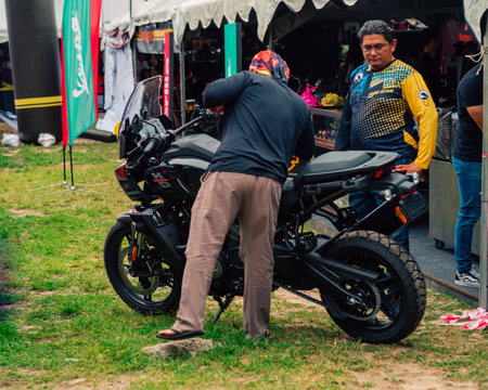 Terengganu, Malaysia - June 26, 2022 : Motorcycle and visitors at the Bike Week event.のeditorial素材