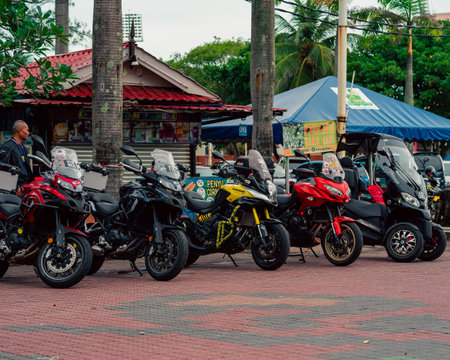 Terengganu, Malaysia - June 26, 2022 : Motorcycles parked in a line at the Bike Week event.のeditorial素材