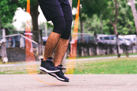 Jumping rope outdoors. Copy space.の写真素材