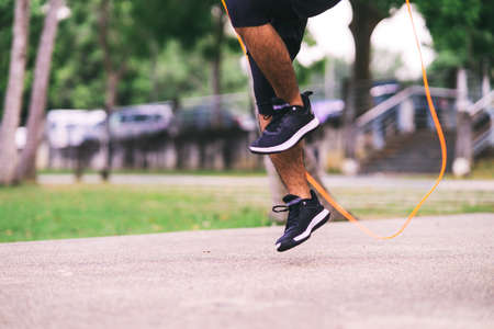 Jumping rope outdoors. Copy space.の写真素材