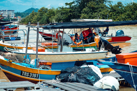 Terengganu, Malaysia - June 26, 2022 Fisherman boats at the river near Pantai Batu Buruk.のeditorial素材