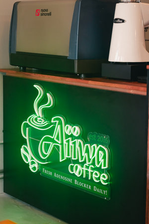 Seremban, Malaysia - March 30, 2022 - Neon Coffee sign a the shop. Aiwa coffee, fresh adenosine blocker daily.のeditorial素材