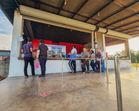 Setiu, Terengganu - May 11, 2022 : The Bayu Keropok Lekor shop selling fish sausage crackers is full of customers.のeditorial素材