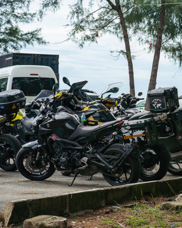 Kuala Terengganu, Malaysia - June 25, 2022: Motorcycles parking along the roadside during Terengganu bike week events.のeditorial素材