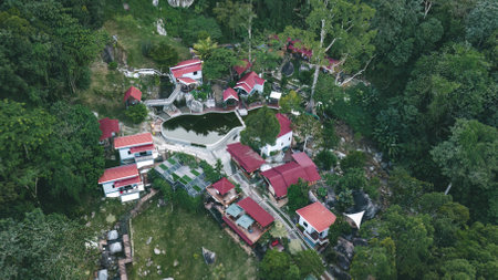 Perak, Malaysia - Oct 19, 2022 Aerial view of the Kuak Hill Resort in Lenggong during sunrise.のeditorial素材
