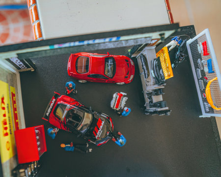 Perak, Malaysia - Aug 12, 2022 : Custom Model Car Toyota Supra in a workshop by Hot Wheels, Diorama art. Top view.のeditorial素材