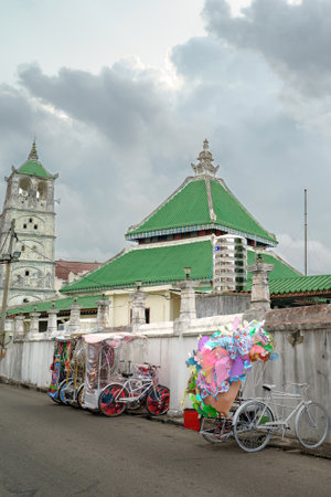 Beautiful trishaw parking near the historic Kampung Kling mosque built in 1748 in the city of Malacca Malaysia.のeditorial素材
