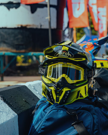 Pahang, Malaysia - Sept 24, 2022 Airoh motocross helmet on the ground in outdoors