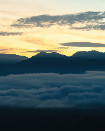 Sea clouds during golden sunrise above Titiwangsa mountains in Lenggong, Perak.の写真素材