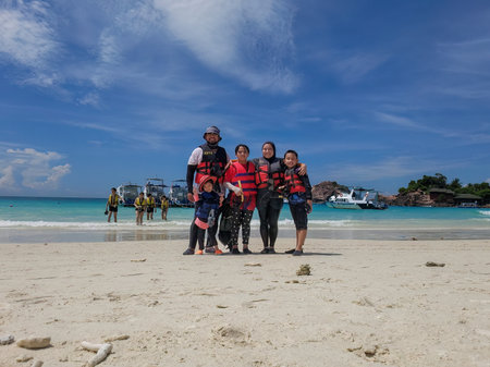 Redang, Malaysia - May 10, 2022 Asian family at the beach. Vacation concept.のeditorial素材