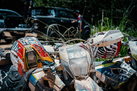 Pahang, Malaysia - Sept 24, 2022 Dirty Enduro motorcycles at the parking space after practice.