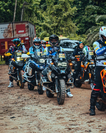 Pahang, Malaysia - Sept 24, 2022 Enduro motorcyclists at the starting point during practice near the jungle.のeditorial素材