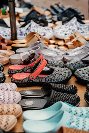 PERAK, MALAYSIA - Oct 18, 2022: Shoes on display for sale at the morning market in Karai, Kuala Kangsar.のeditorial素材