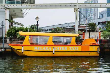 Melaka, Malaysia - July 9, 2023 Water taxi at the Malacca river, UNESCO World Heritage Site, Melaka State, Malaysia, Southeast Asia, Asiaのeditorial素材