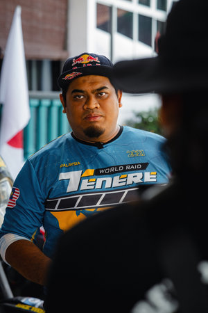Pahang, Malaysia - Sept 24, 2022 Portrait of a motorcycle rider wearing Super Tenere jersey shirt in outdoor.のeditorial素材
