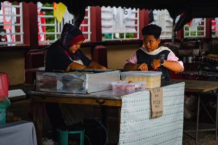 Pahang, Malaysia - Sept 24, 2022 Local stall selling roti canai in Kuala Tahan National Park.のeditorial素材
