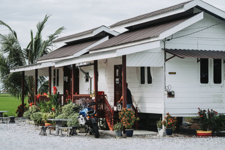 Sekinchan, Malaysia - Oct 6, 2022 Wooden house in the village.のeditorial素材