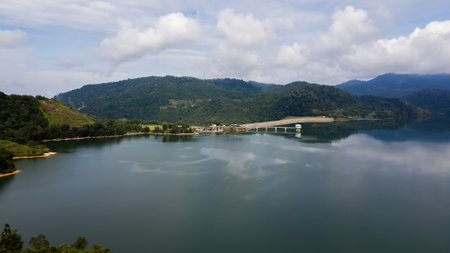 Green lake and rainforest tropical trees in Kuala Kubu Bharu, Malaysia.の写真素材