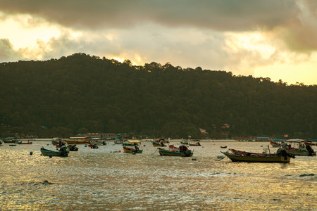 Terengganu, Malaysia - March 16, 2023 Colourful boats  near the floating jetty in Perhentian Island in the morning.のeditorial素材