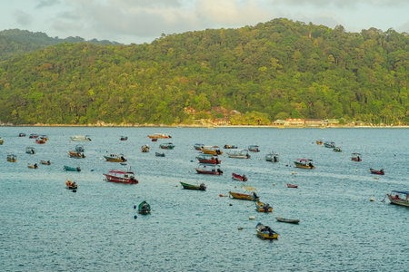 Terengganu, Malaysia - March 16, 2023 Colourful boats  in Perhentian Island in the morning.のeditorial素材